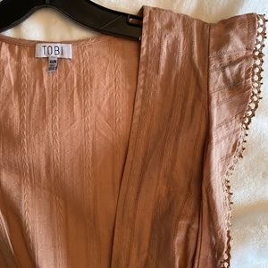 Low cut, fashionable Tobi wrap dress. Size M